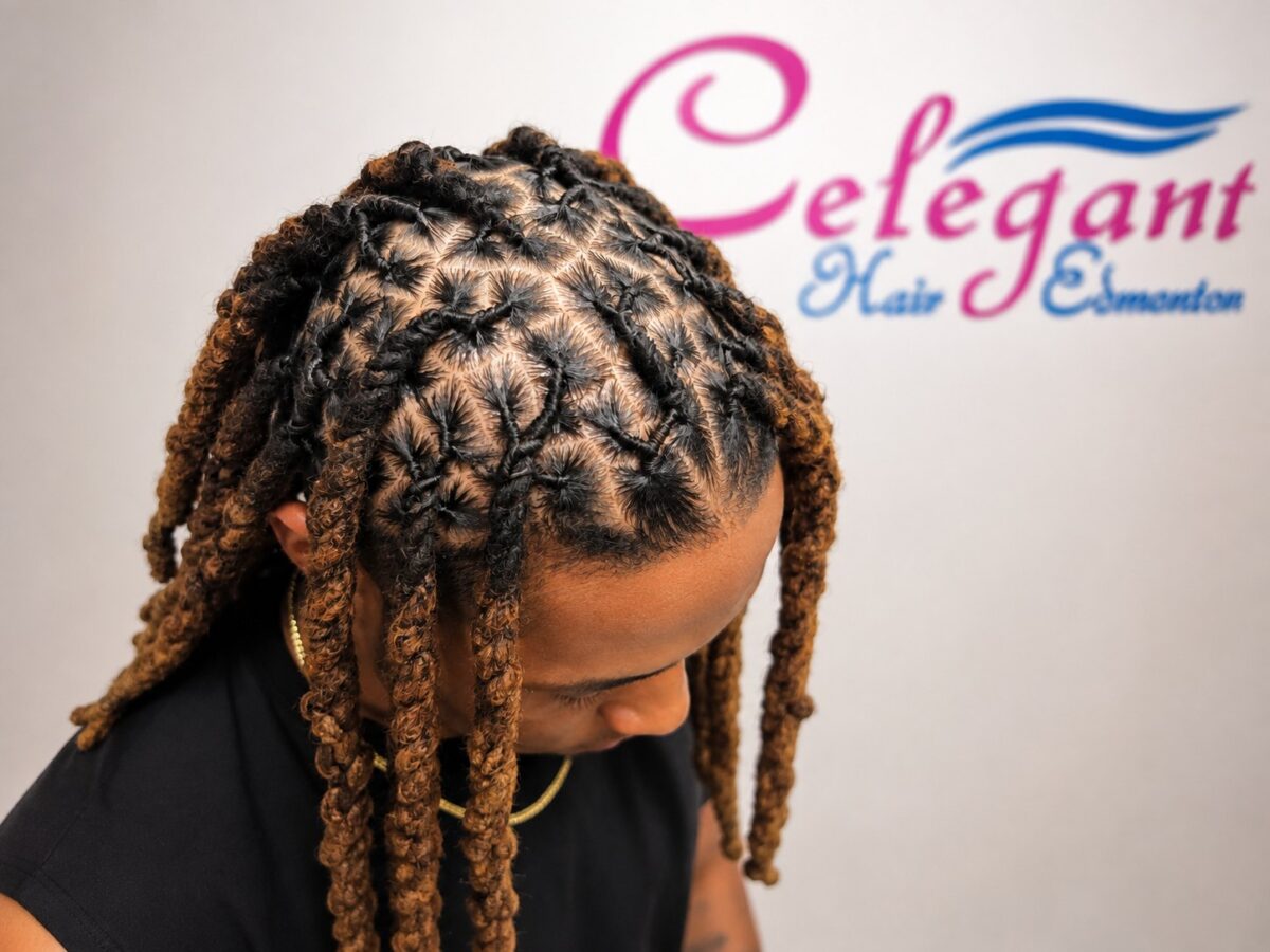 A client's locs just after interlocking, showing clean grid parting at the roots